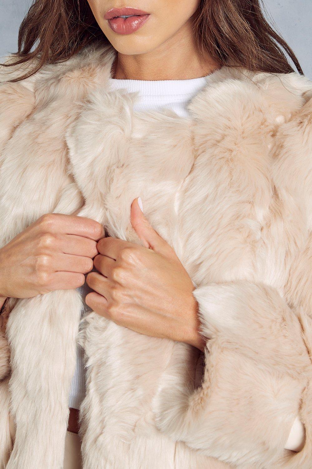 Panelled fur outlet coat