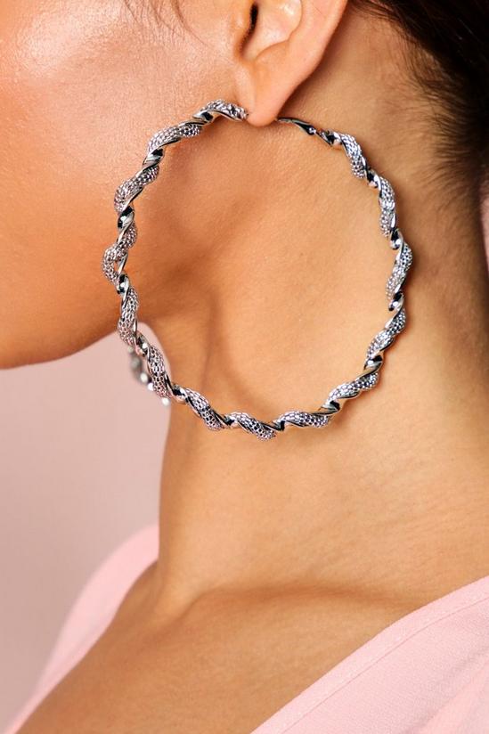 MissPap Metal twist hoop earrings 1