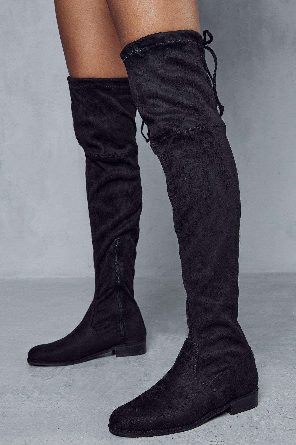 Flat tie back store thigh high boots